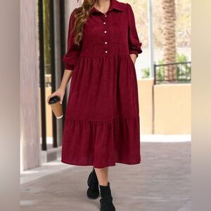 Velvet Millennium burgundy knee length dress with pockets.